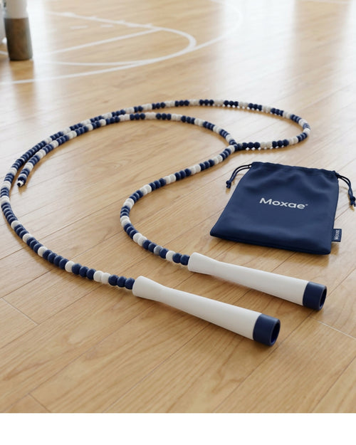 Moxae Beaded Freestyle Jump Rope 2.8 m Navy and White with Pouch - Lifestyle view